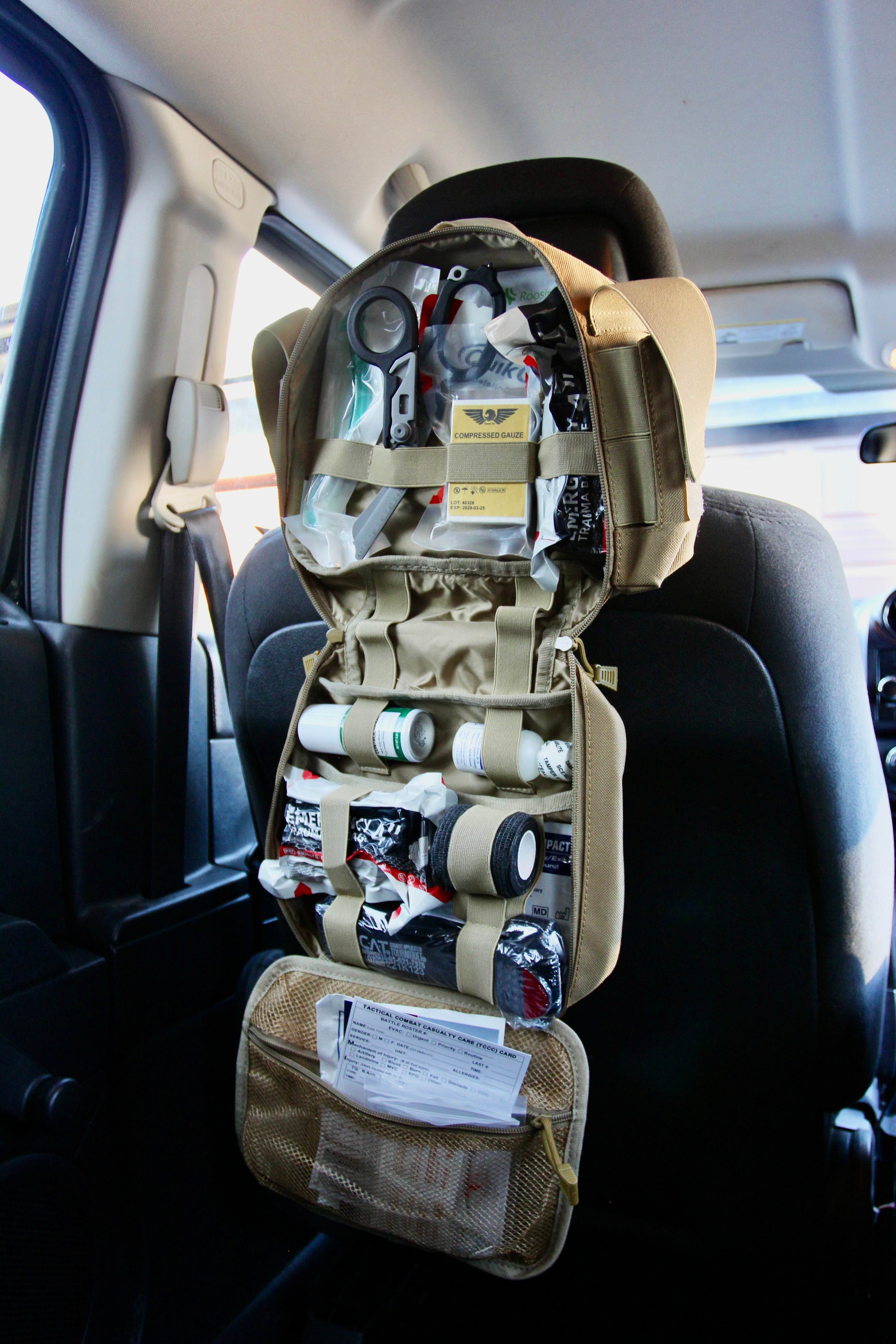 tan Police2Bag trauma response bag deployed in vehicle showing organized trauma supplies