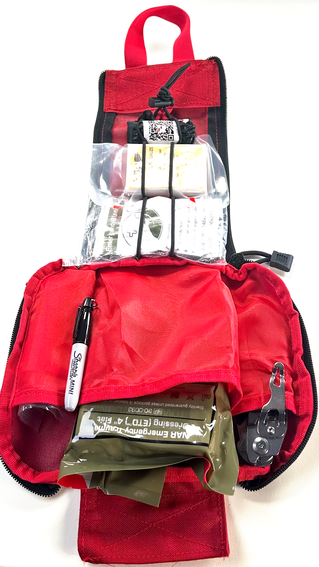 BePrepared2Treat Red IFAK opened to show organized emergency trauma supplies