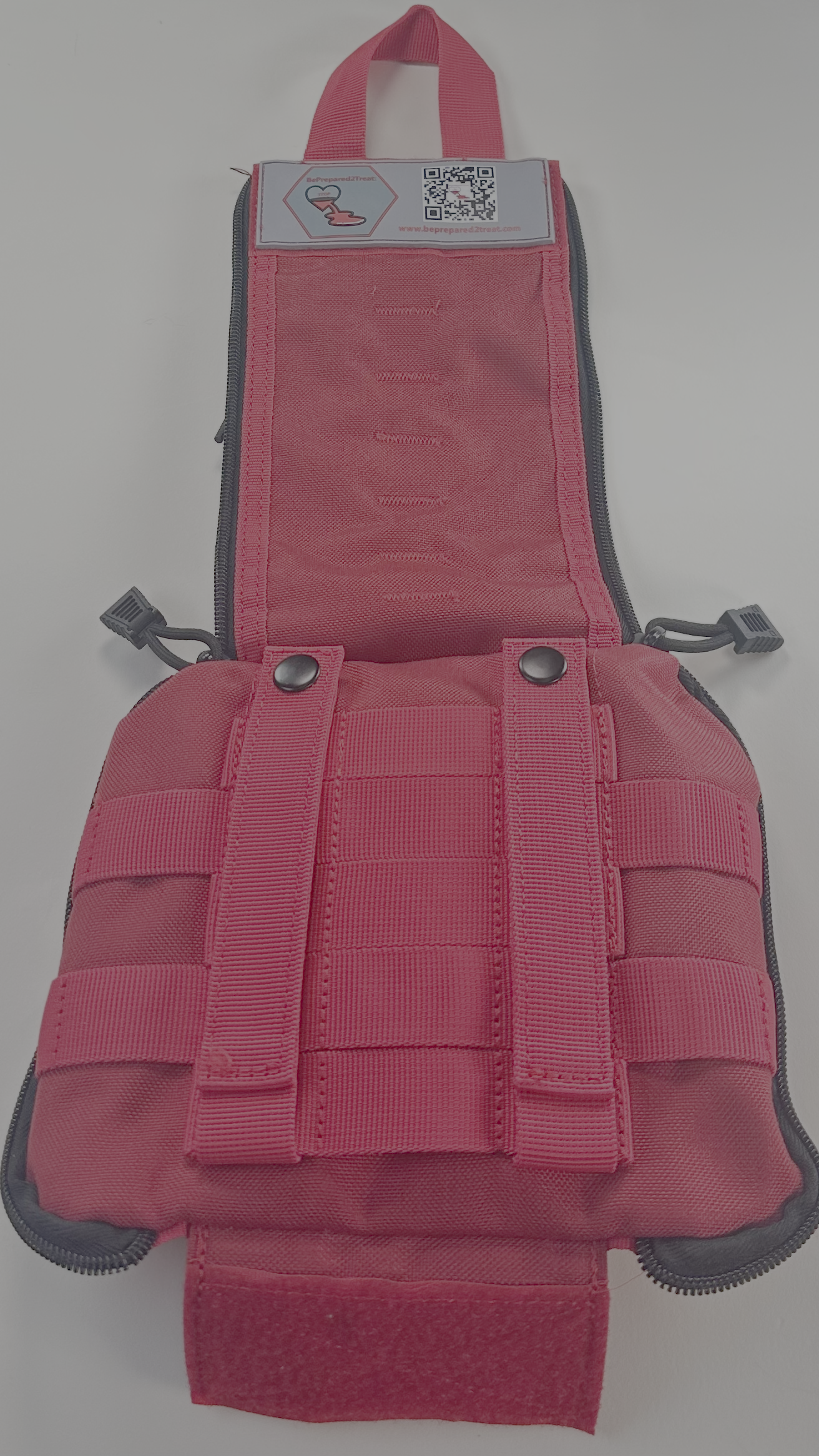 BePrepared2Treat Red IFAK opened to show rear attachment straps and modular bag design