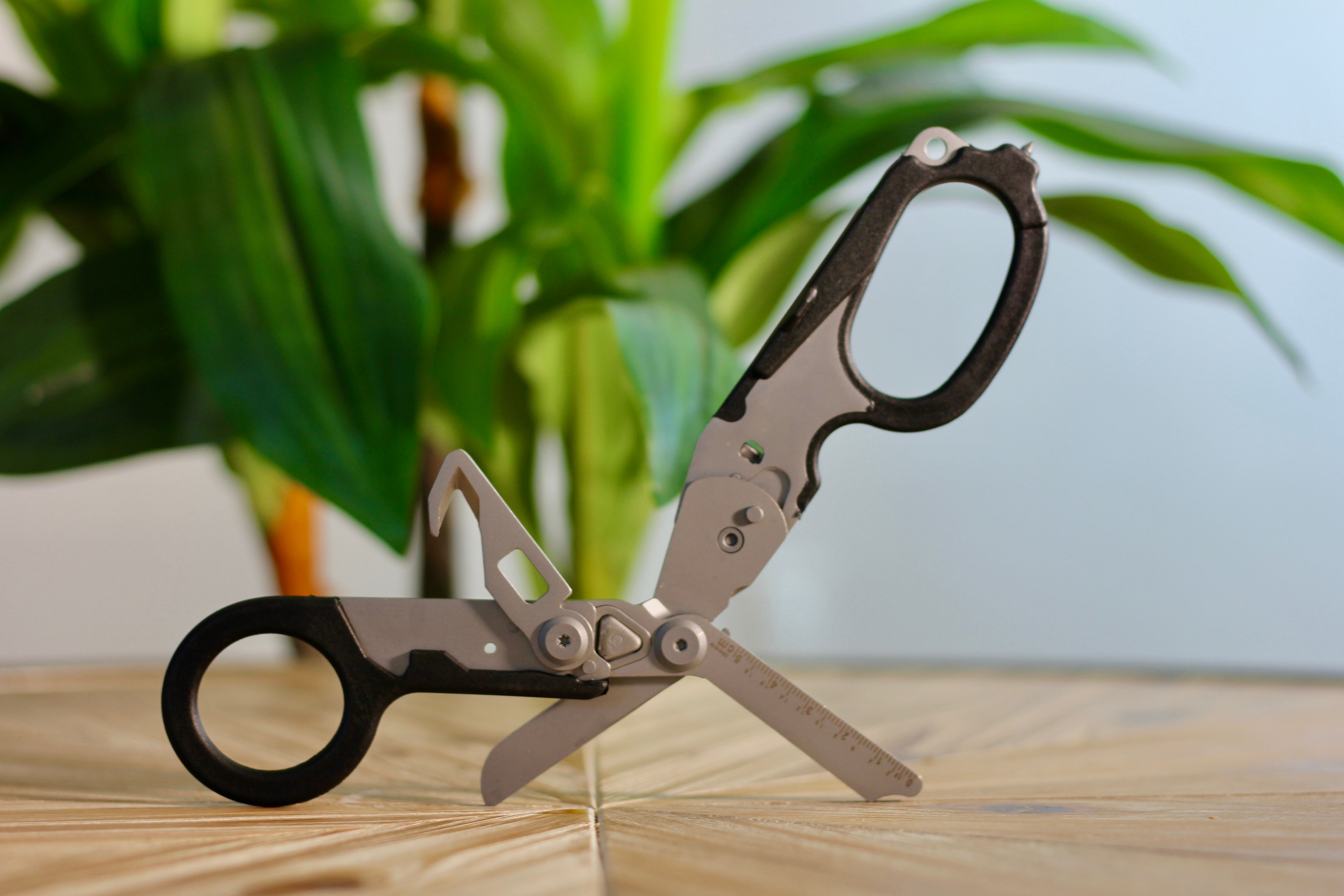 Folding trauma shears opened to show cutting tools included with the BePrepared2Treat Red IFAK