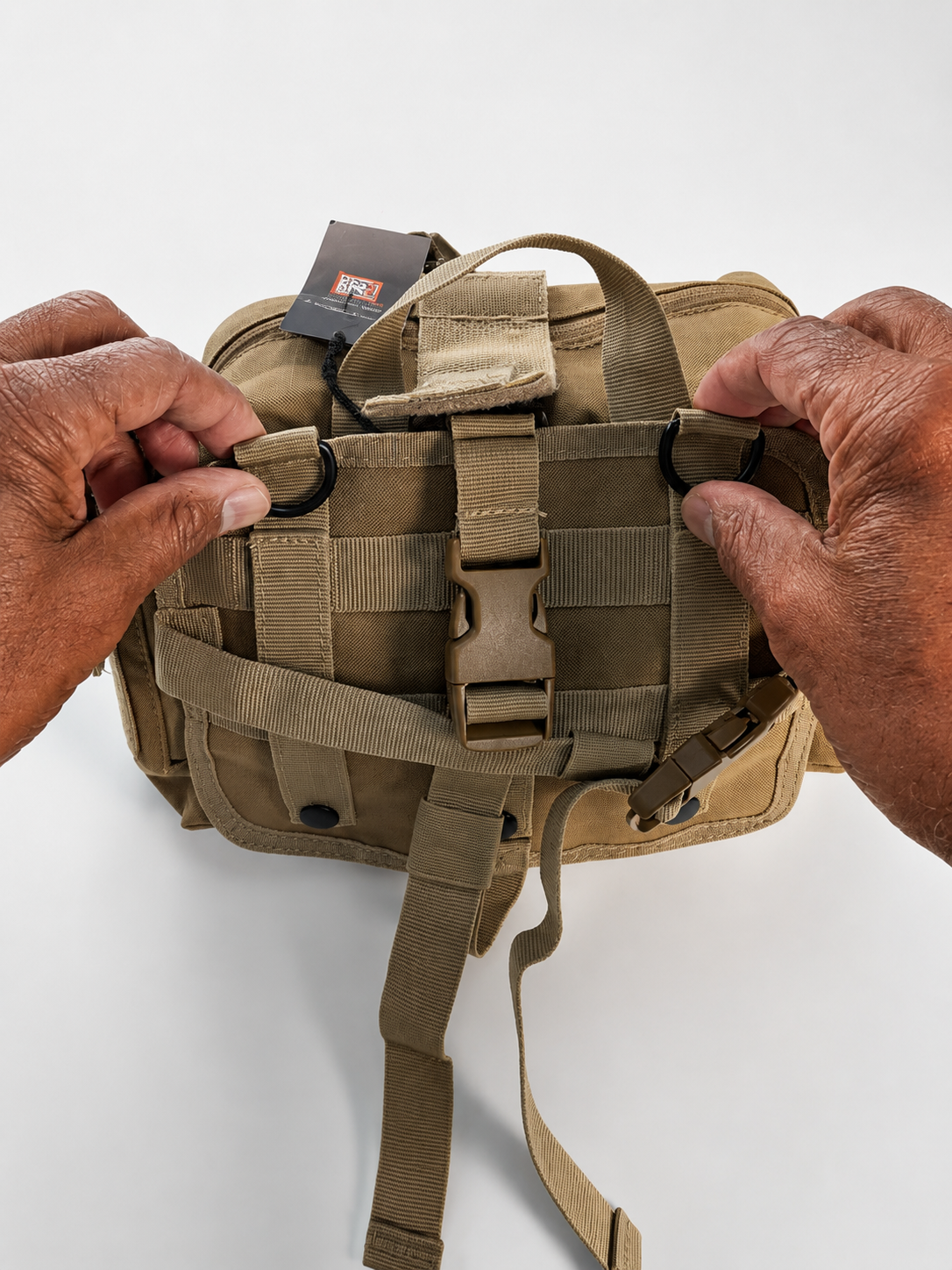 BP2T Police2Bag rear view showing horizontal and vertical attachment straps and D-rings for secure vehicle headrest mounting.